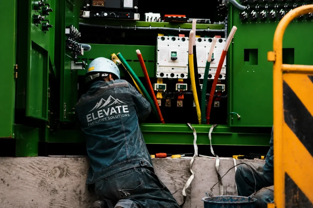 Commercial preventative maintenance technician servicing facility equipment in Australia